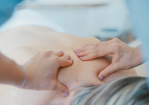 Gentle hands giving a soothing skin treatment